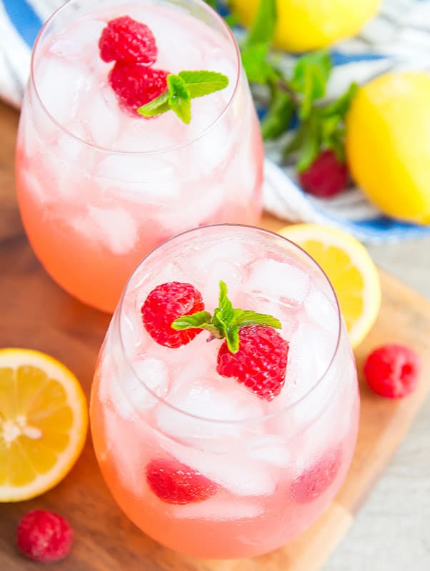 Pink punch recipes are delicious and colorful. Prepare them for birthday party or for baby shower celebrations. You can make them nonalcoholic for kids, with ice cream, with sherbet, and with alcohol too. Included is a recipe for pink punch with pineapple juice, strawberry, and more. #pinkpunch #refreshments