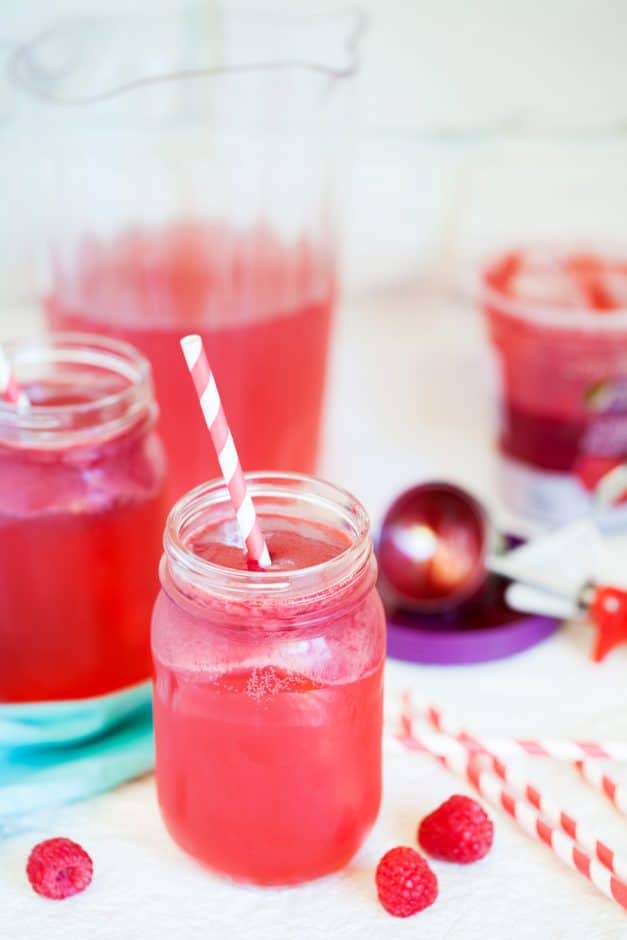 Pink punch recipes are delicious and colorful. Prepare them for birthday party or for baby shower celebrations. You can make them nonalcoholic for kids, with ice cream, with sherbet, and with alcohol too. Included is a recipe for pink punch with pineapple juice, strawberry, and more. #pinkpunch #refreshments
