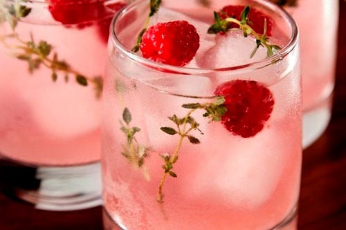 Pink punch recipes are delicious and colorful. Prepare them for birthday party or for baby shower celebrations. You can make them nonalcoholic for kids, with ice cream, with sherbet, and with alcohol too. Included is a recipe for pink punch with pineapple juice, strawberry, and more. #pinkpunch #refreshments