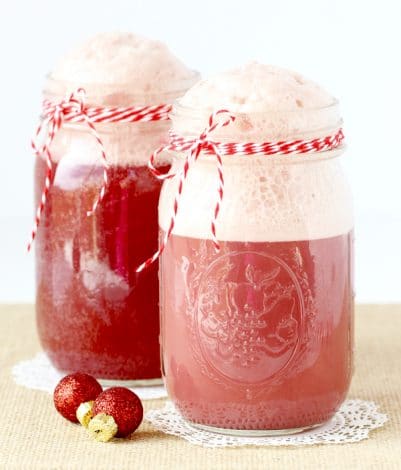 Pink punch recipes are delicious and colorful. Prepare them for birthday party or for baby shower celebrations. You can make them nonalcoholic for kids, with ice cream, with sherbet, and with alcohol too. Included is a recipe for pink punch with pineapple juice, strawberry, and more. #pinkpunch #refreshments