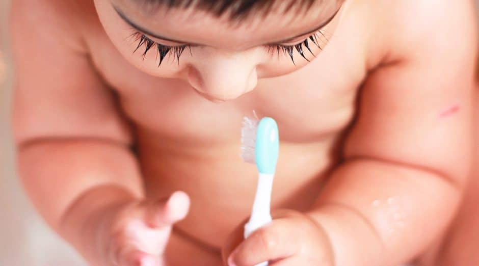 Looking for baby teething remedies that actually work? This is a comprehensive list of teething remedies to choose from. They include natural homemade remedies like frozen breast milk, DIY baby popsicles, remedies with essential oils, etc. These remedies can be used at nighttime for sleep, for 4 months old and beyond for toddlers, for molars, for your infant. Pin it. #teething #remedies