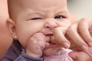 Looking for baby teething remedies that actually work? This is a comprehensive list of teething remedies to choose from. They include natural homemade remedies like frozen breast milk, DIY baby popsicles, remedies with essential oils, etc. These remedies can be used at nighttime for sleep, for 4 months old and beyond for toddlers, for molars, for your infant. Pin it. #teething #remedies