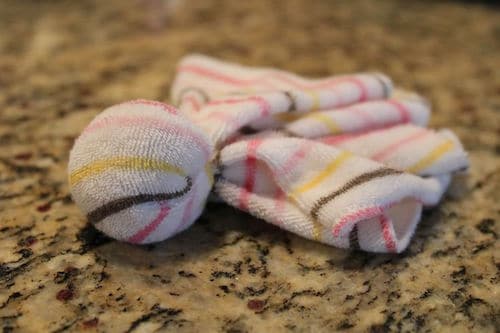 Looking for baby teething remedies that actually work? This is a comprehensive list of teething remedies to choose from. They include natural homemade remedies like frozen breast milk, DIY baby popsicles, remedies with essential oils, etc. These remedies can be used at nighttime for sleep, for 4 months old and beyond for toddlers, for molars, for your infant. Pin it. #teething #remedies