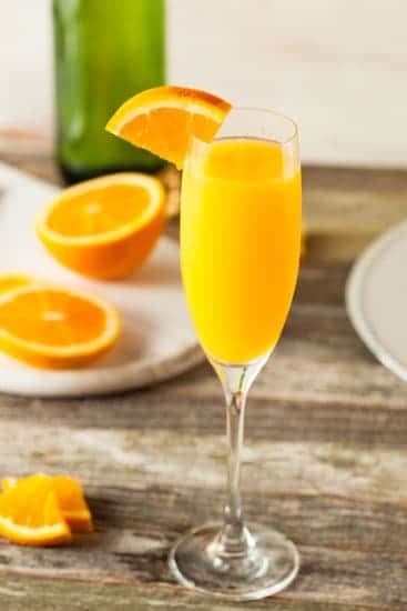 How to set up an Easy DIY Mimosa Bar - Garnish with Lemon