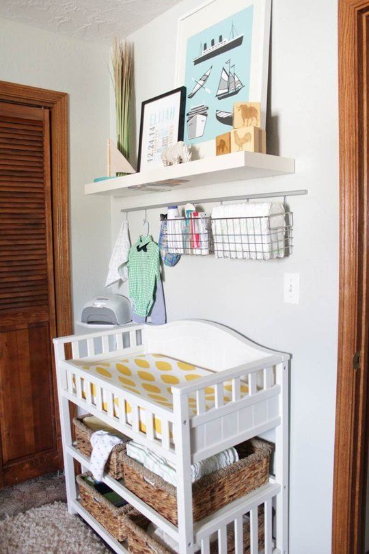 Shelves over outlet changing table