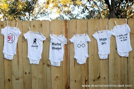 Baby shower clothesline clothespin decoration with onesies. CUTENESS!