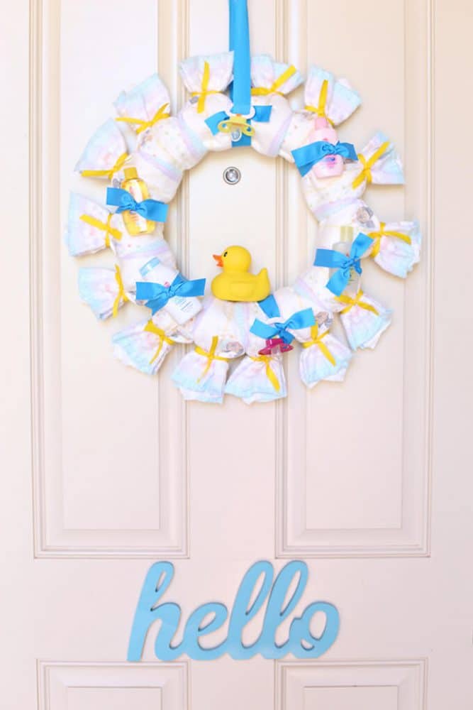 Baby Shower Wreaths | Beautiful ideas for creating your own welcome wreath - perfect for the front door. Amazing DIY designs for baby girl, baby boy, and neutral baby wreath ideas. #babyshower #welcomewreath #homedecor