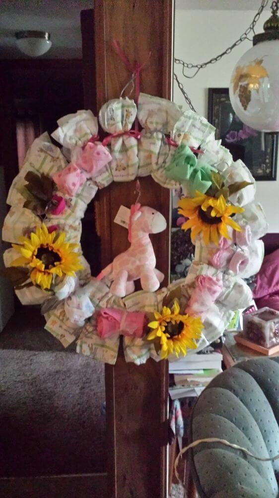 Baby Shower Wreaths | Beautiful ideas for creating your own welcome wreath - perfect for the front door. Amazing DIY designs for baby girl, baby boy, and neutral baby wreath ideas. #babyshower #welcomewreath #homedecor