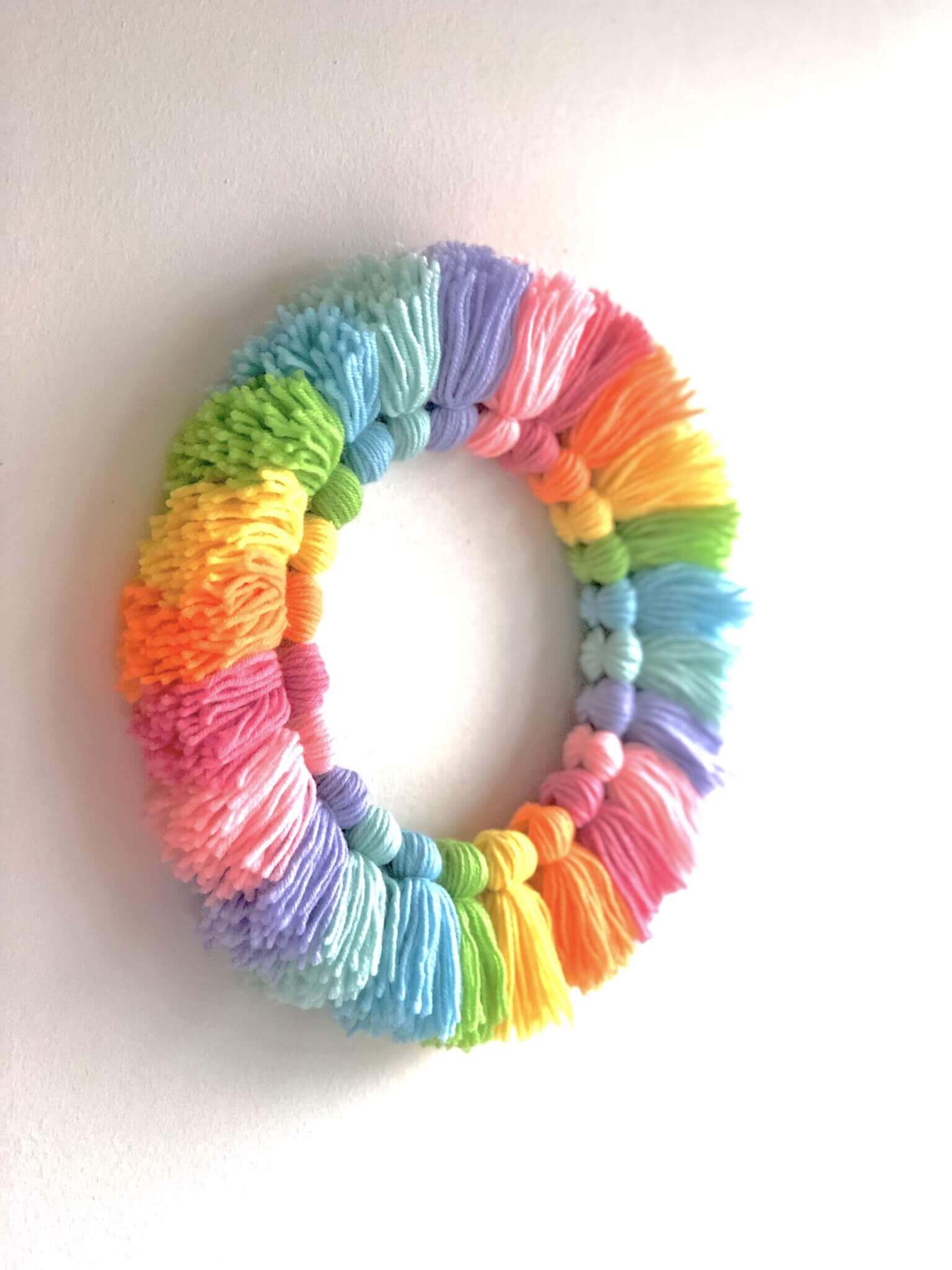 Baby Shower Wreaths | Beautiful ideas for creating your own welcome wreath - perfect for the front door. Amazing DIY designs for baby girl, baby boy, and neutral baby wreath ideas. #babyshower #welcomewreath #homedecor