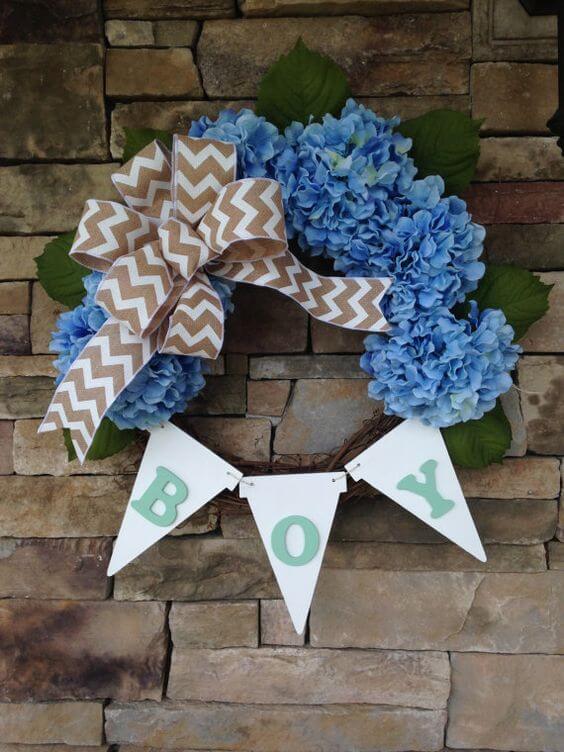 Baby Shower Wreaths | Beautiful ideas for creating your own welcome wreath - perfect for the front door. Amazing DIY designs for baby girl, baby boy, and neutral baby wreath ideas. #babyshower #welcomewreath #homedecor