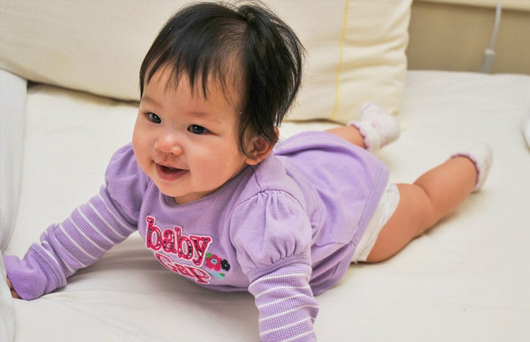 when do babies roll over